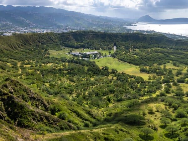 Diamond head view of center of crater with park buildings entrance Oahu