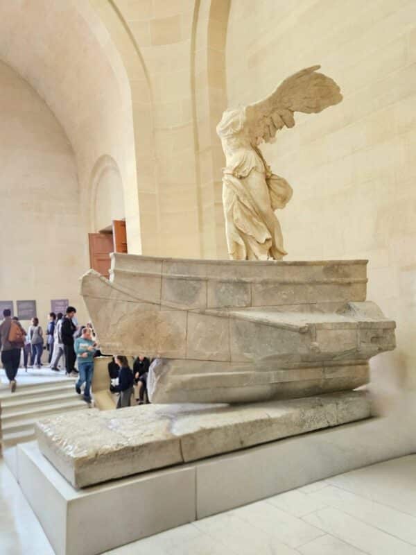 Winged Victory statue inside the Louvre museum